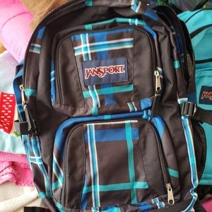 JanSport plaid canvas computer pocket backpack